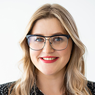 Successful woman portrait. Female power. Body positive. Eyewear accessories. Confident cheerful smiling overweight obese model face in glasses isolated on white.